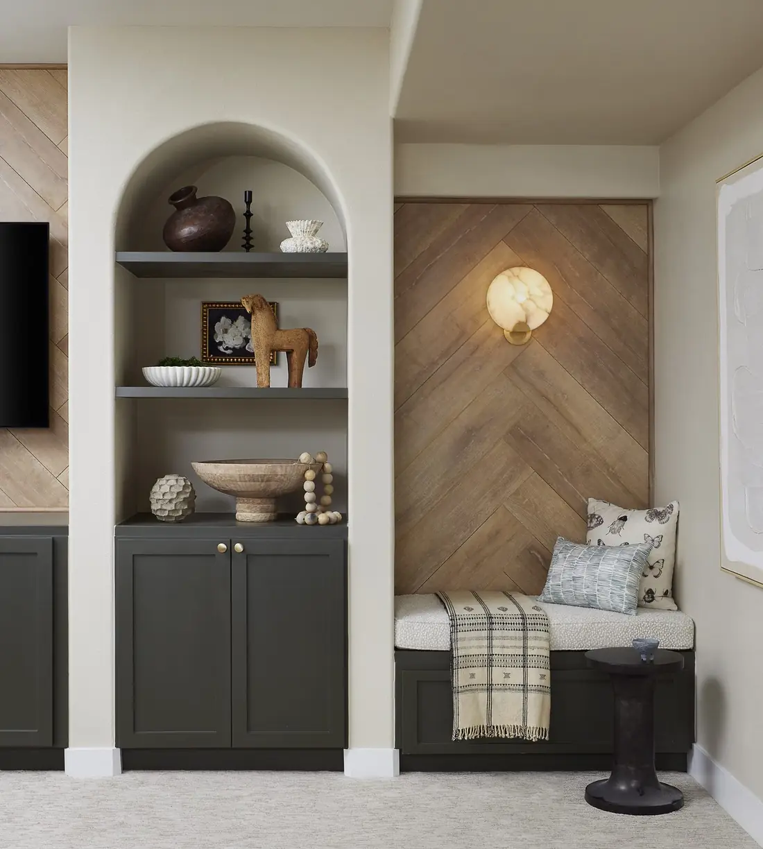 Herringbone accent wall with built-in window seat